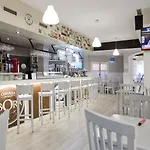 Real De Hotel